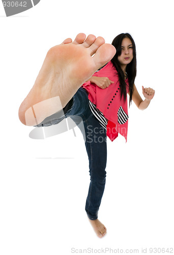 Image of woman kicking