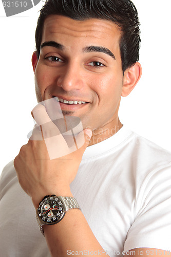 Image of Happy smiling man wearing watch