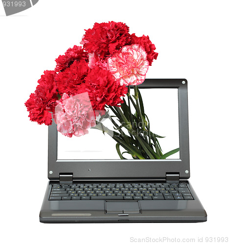 Image of laptop with carnations bouquet