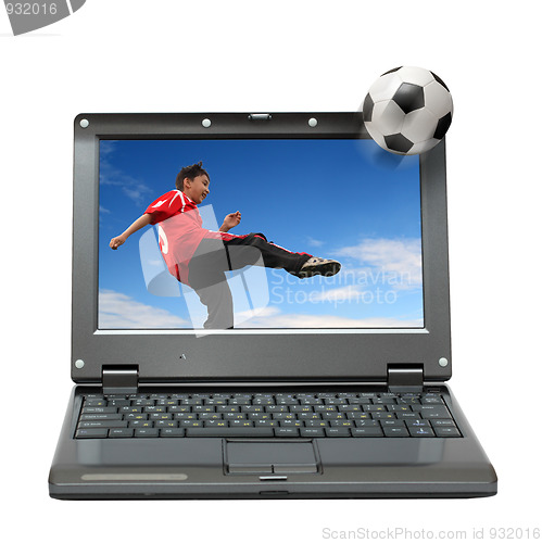 Image of laptop with boy playing football