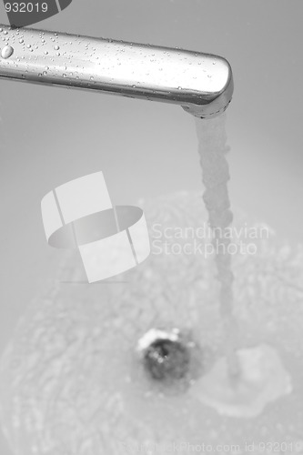 Image of tap with strong stream of water