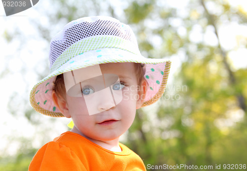 Image of baby in hat outdoor