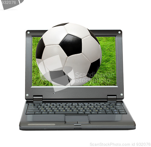 Image of small laptop with soccer football ball