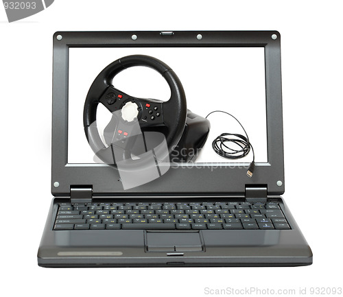 Image of laptop with gaming car simulator