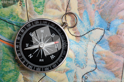 Image of compass on geography map