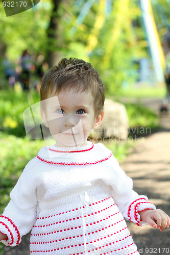 Image of happy baby in white dress