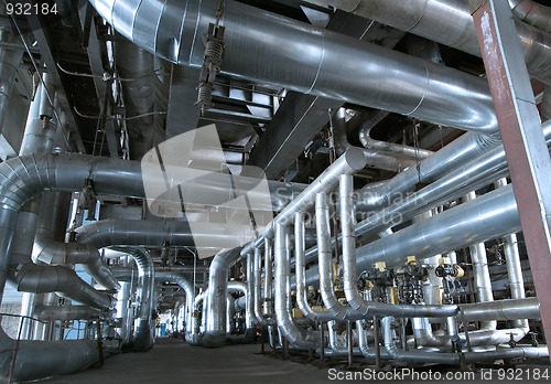 Image of Equipment, cables and piping as found inside of a modern industr