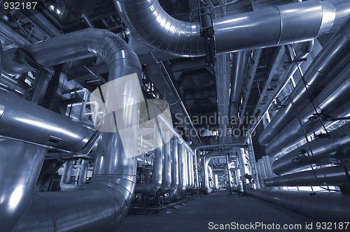 Image of Equipment, cables and piping as found inside of a modern industr