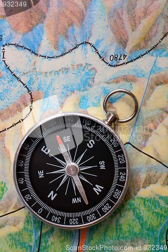 Image of compass on geography map