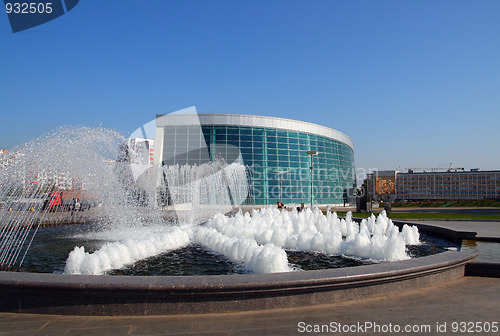 Image of modern glass building and fountain