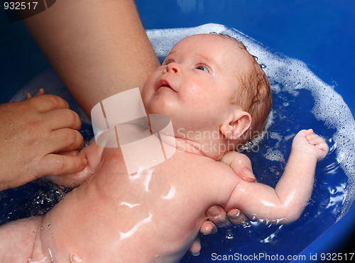 Image of newborn baby in bathtub