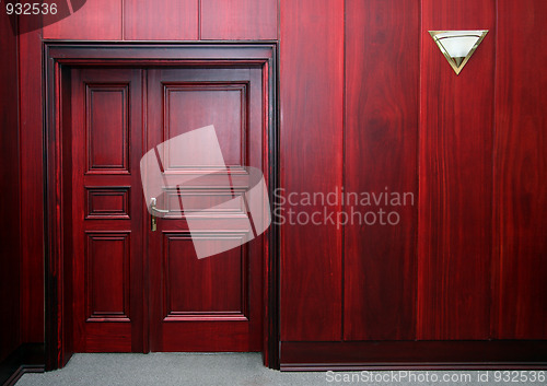 Image of luxury mahogany interior with door