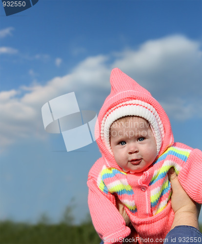 Image of baby in pink hood