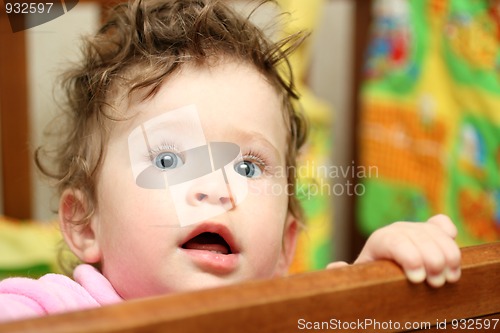 Image of touching baby looking up