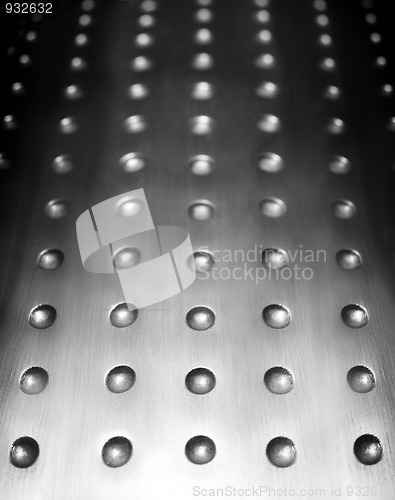 Image of metal surface background with holes