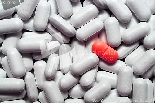 Image of different - red pill among pills