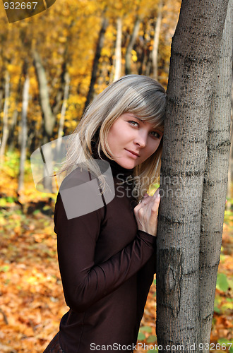 Image of beauty girl in autumn park