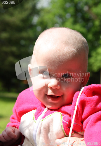 Image of happy smiling baby outdoors