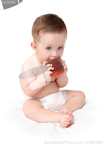 Image of baby eating peach