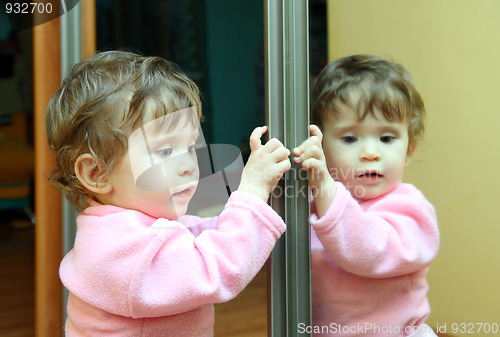 Image of baby with mirror
