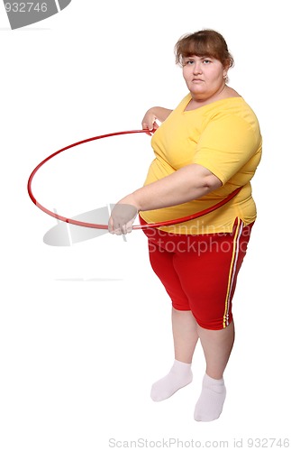 Image of overweight woman exercising with hoop
