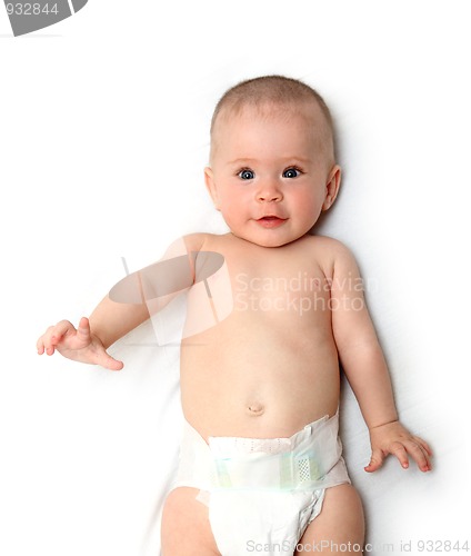 Image of smiling baby girl in diaper