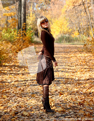 Image of girl in autumn park