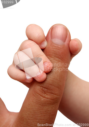 Image of baby holding father finger