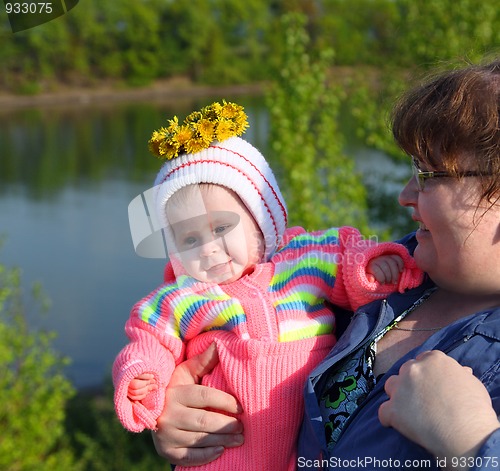 Image of happy baby girl and mother