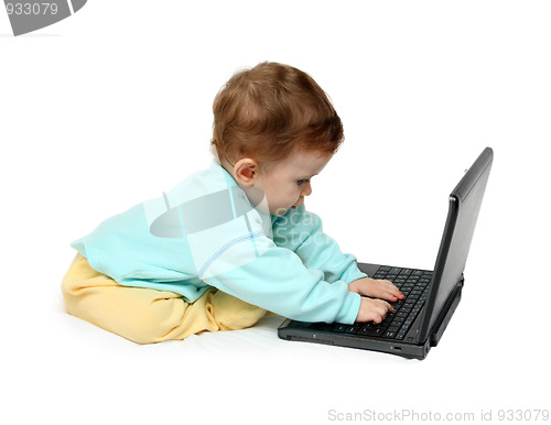 Image of baby working on laptop