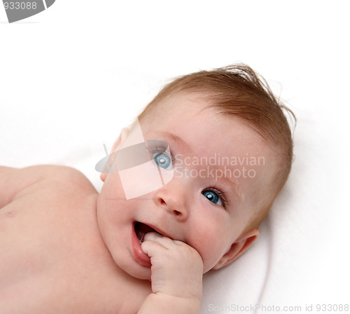 Image of baby girl sucking fingers