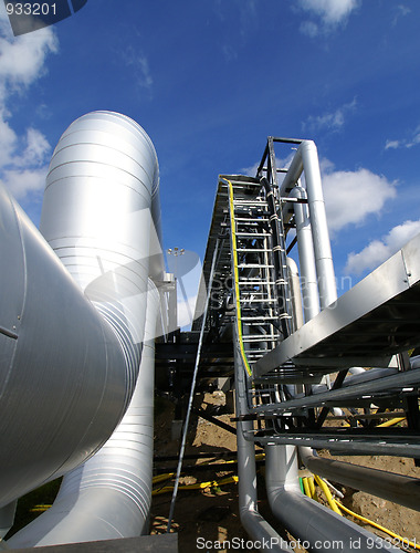 Image of Industrial zone, Steel pipelines in blue sky