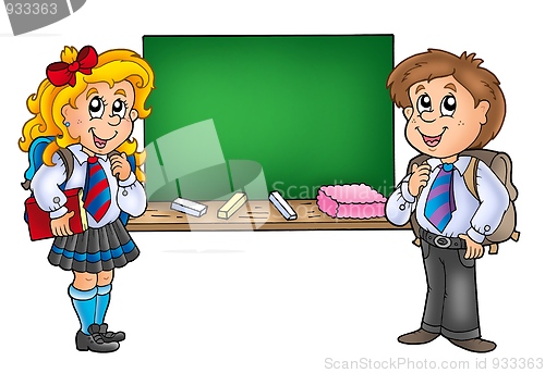 Image of Girl and boy with old chalkboard