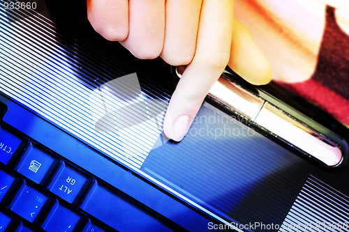 Image of Working at laptop .