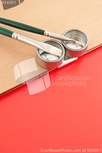 Image of Painter pallete detail with brushes