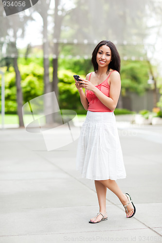 Image of Woman texting
