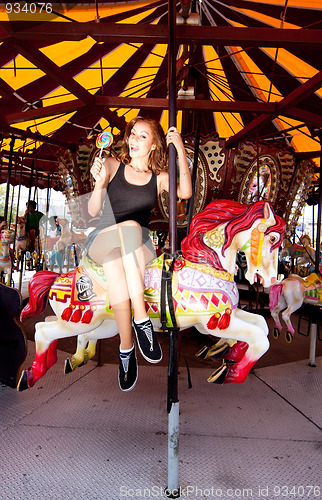 Image of Girl having fun in amusement park