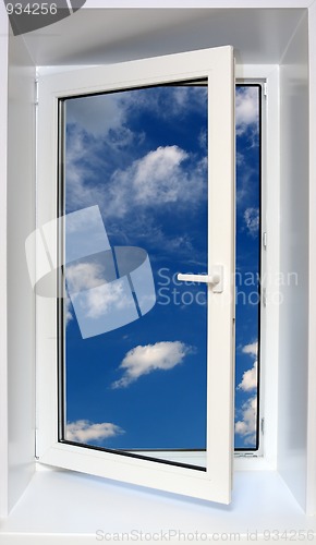 Image of view on sky through open window