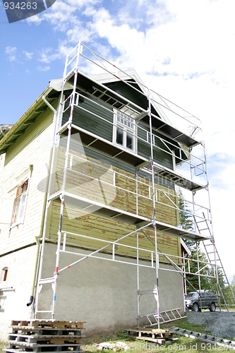Image of Old house getting new paint