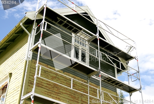 Image of Old house getting new paint