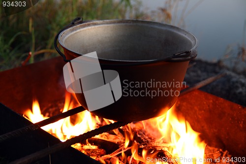 Image of kettle over campfire