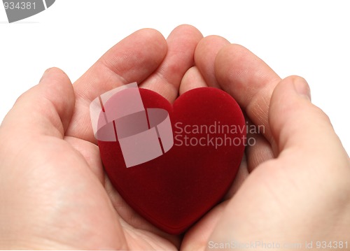 Image of man's hands with heart