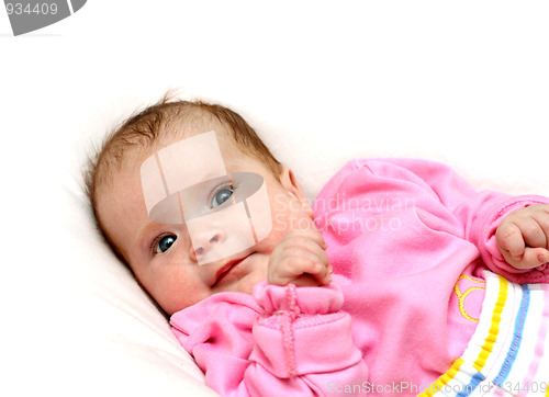 Image of newborn baby girl on pillow