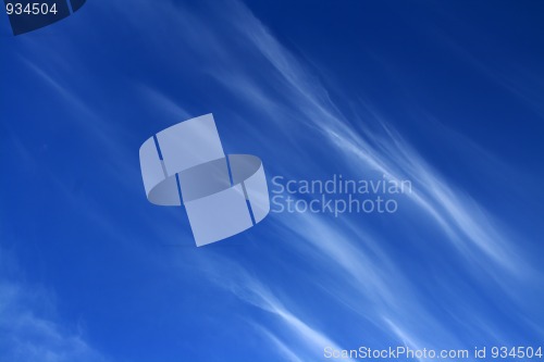 Image of blue sky with fleecy clouds