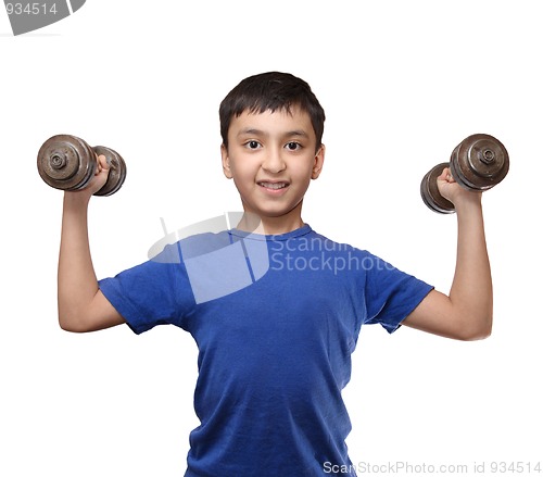 Image of similing boy exercise with dumbbells