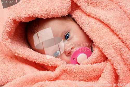 Image of newborn baby with soother