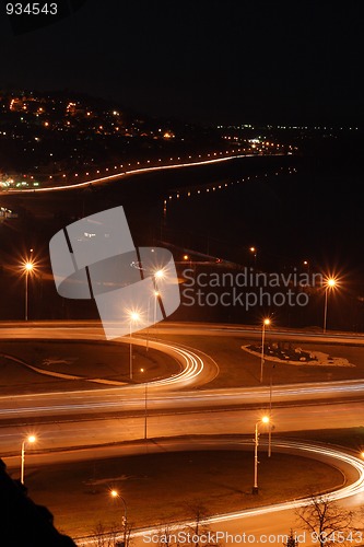 Image of night road junction and embankment