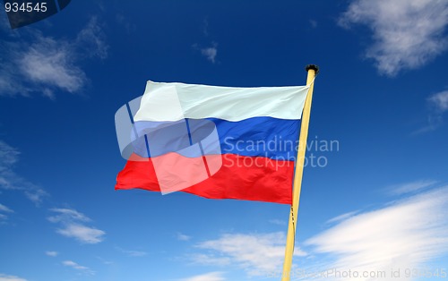 Image of russian flag on blue sky background