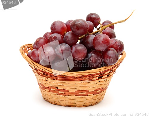 Image of wet grape berry bunch in basket