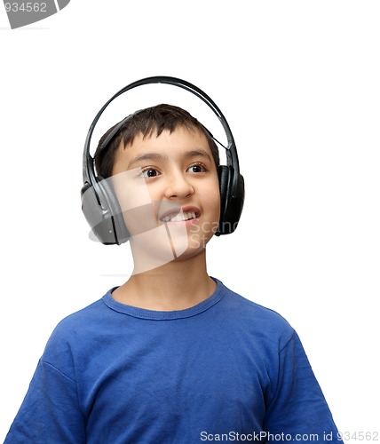 Image of boy listening music in headphones